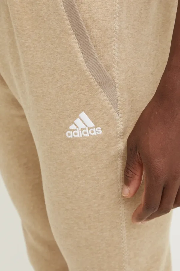 adidas spodnie dresowe kolor beżowy melanżowe IY6606 - obrazek 3